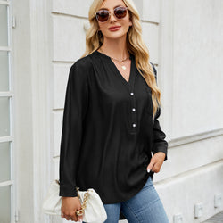 A row of button-down imitation denim, long-sleeved shirt and top